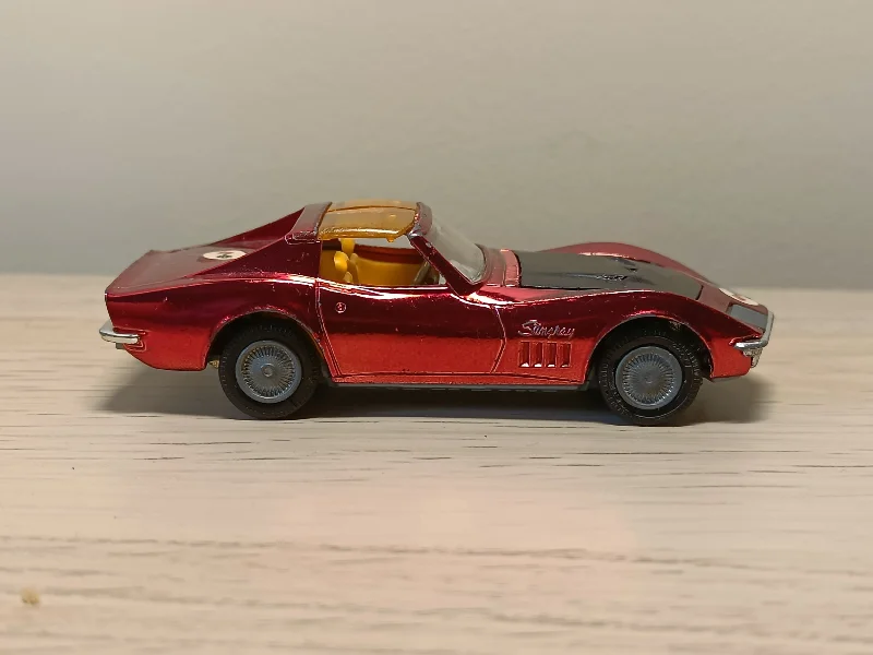 Model Kit of a Vintage Volkswagen Beetle for DIY Customization300 Chevrolet Corvette Sting Ray in red